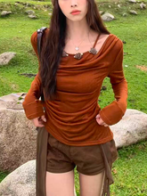 Ladies' long-sleeved halter top with neckline decoration